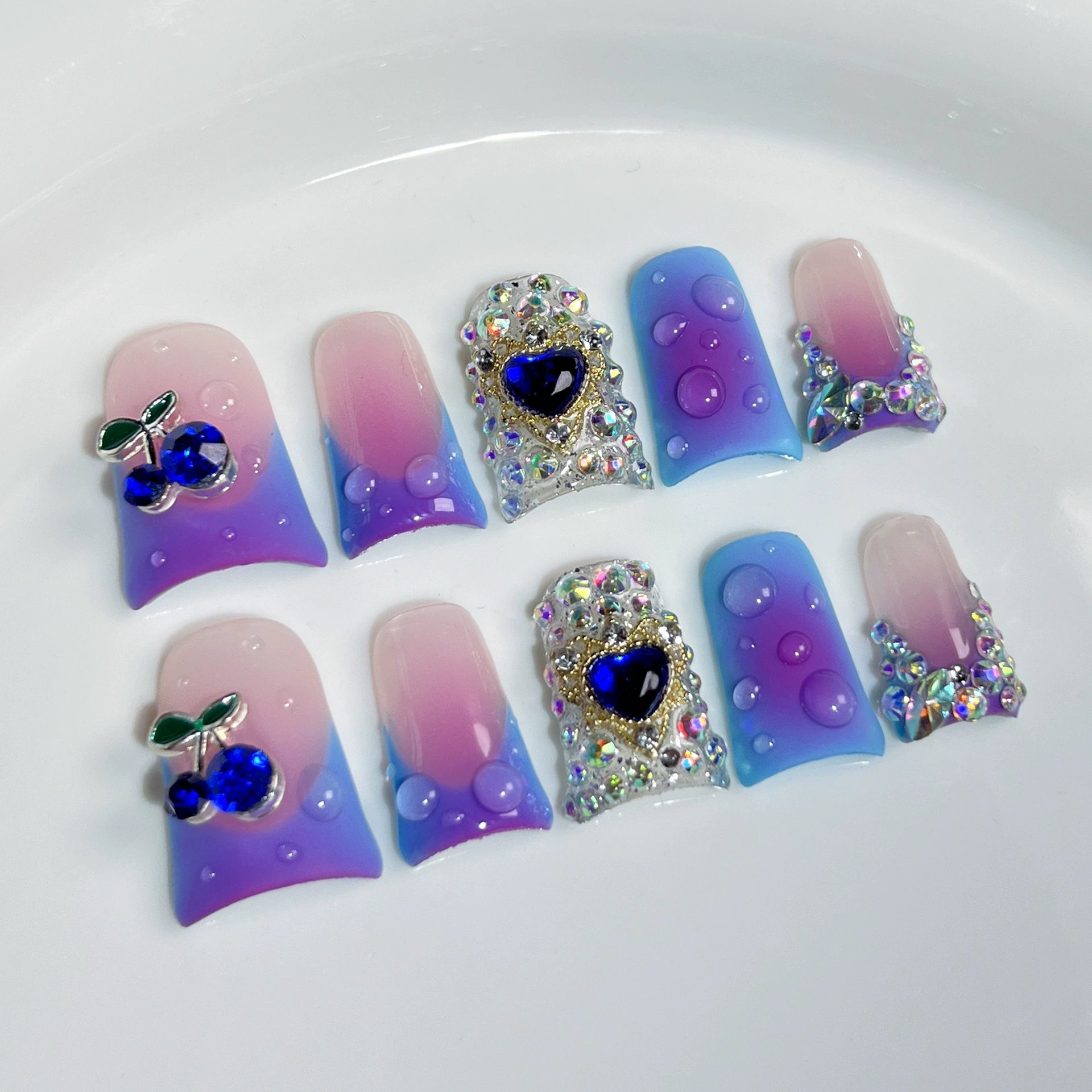 Dreamy Sweet & Edgy Purple-Blue Gradient Nails | 3D Cherry & Water Drop Press-On Nails with Rhinestones & Heart Gems | Festival, Party, Halloween Nail Art