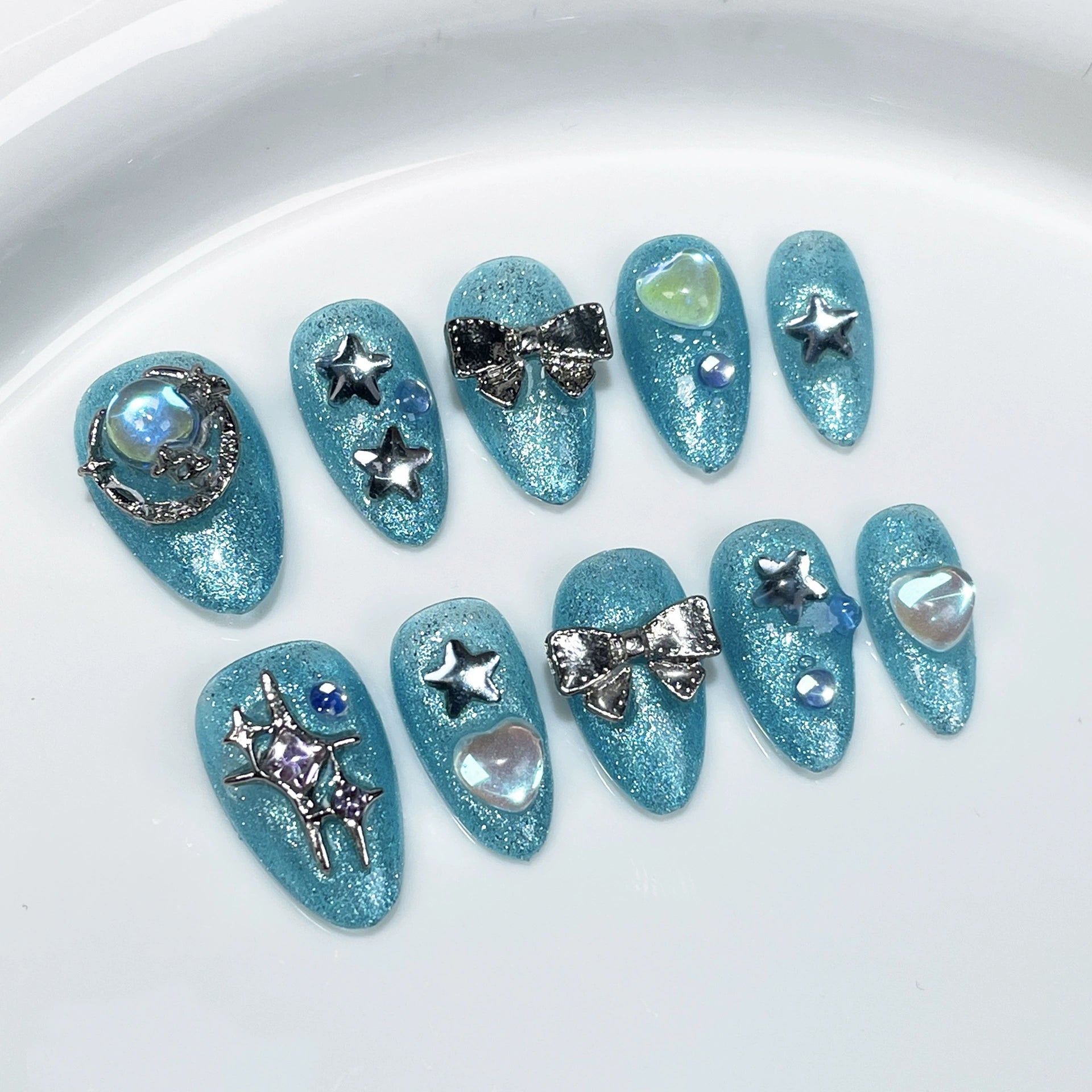 Sparkling Aqua Blue Press-On Nails with Stars, Moon & Pearls | Dreamy Ocean & Starry Sky Nail Art for Summer & Parties