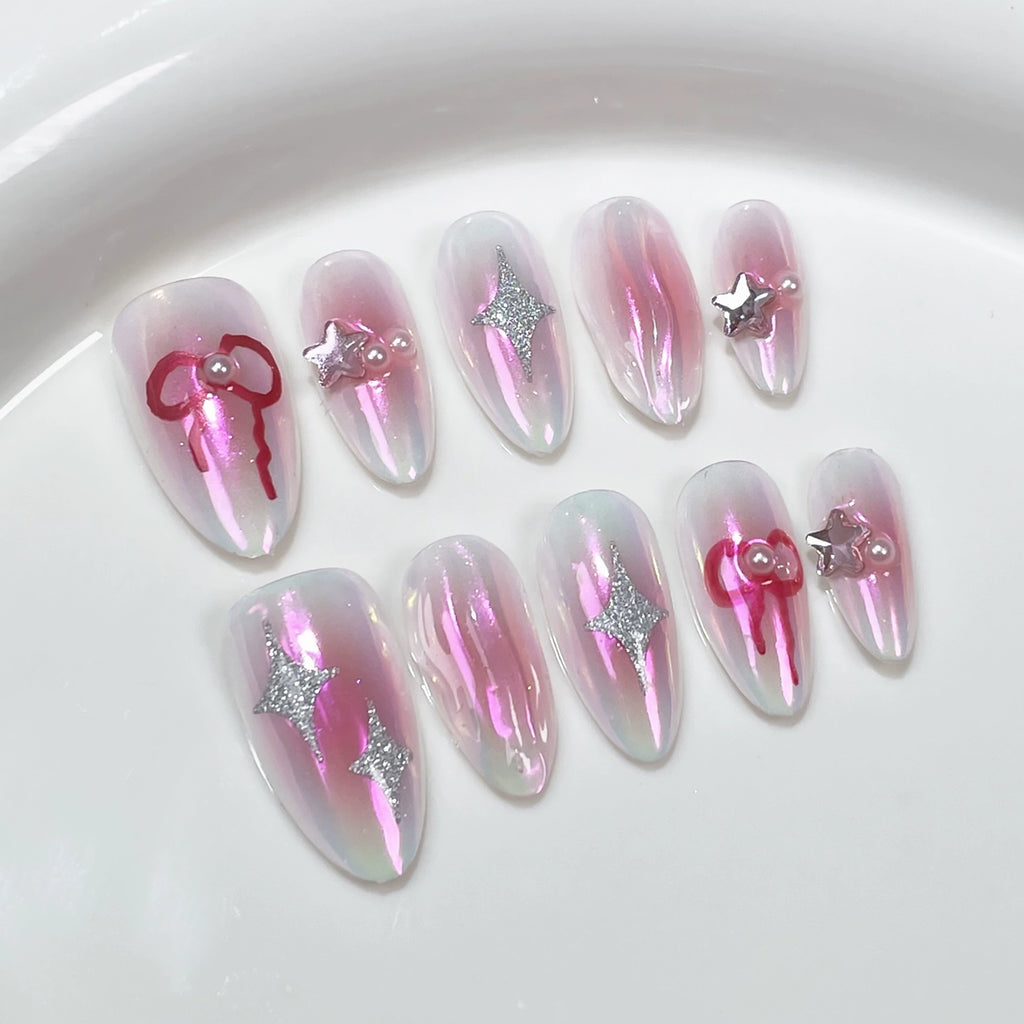 Dreamy Fairy Press-On Nails - Iridescent Pink & White Aurora with Silver Stars, Red Bow & Pearls | Ethereal Romantic Nail Design for Party, Photoshoot & Date
