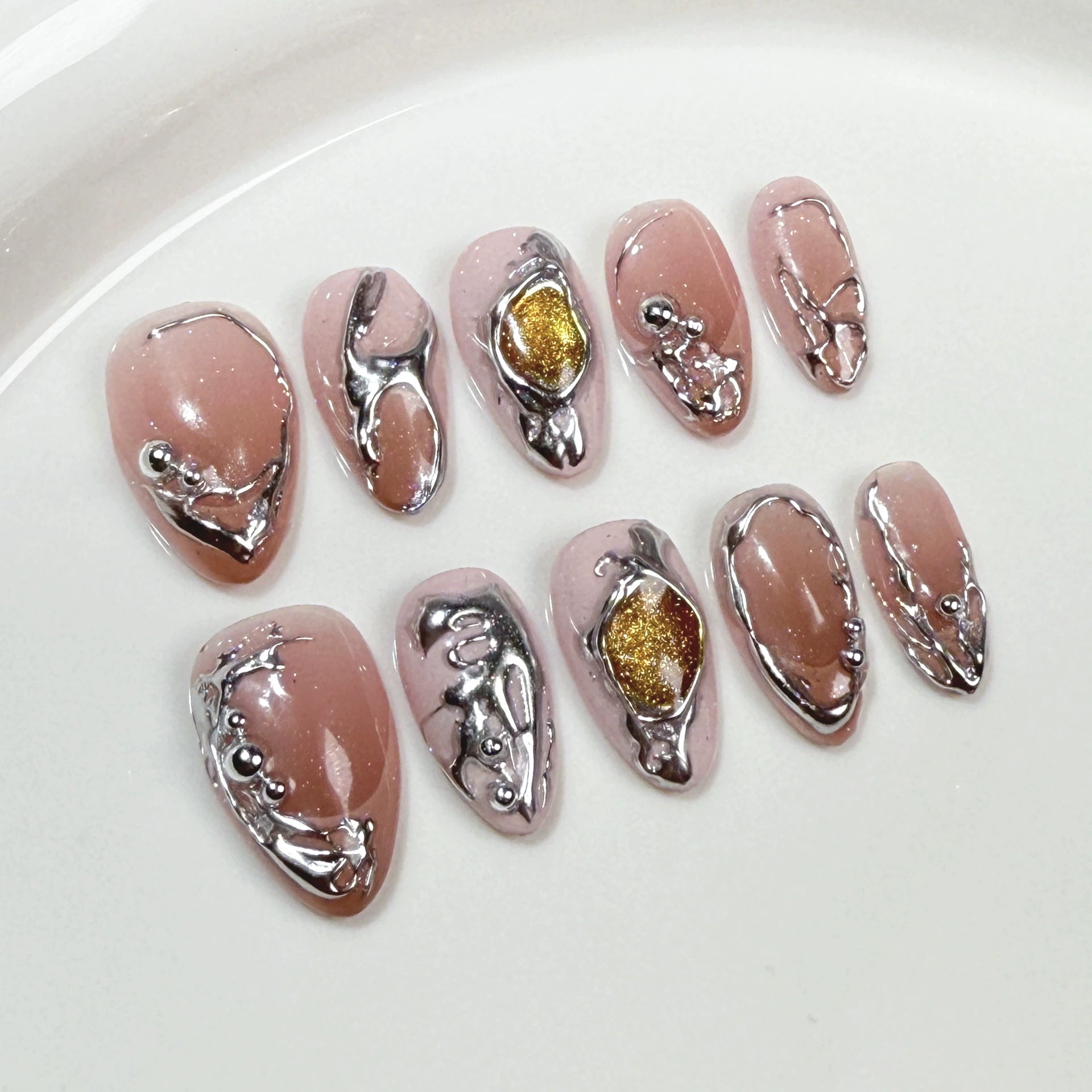 Nude Pink Metallic Press-On Nails with Silver Futuristic Lines & Gold Glitter Accents | Trendy Avant-Garde Nail Art for Fashion Shows & Parties